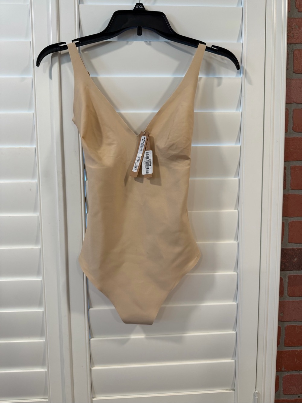 SKIMS Nude Beige V-Neck One-Piece Bodysuit